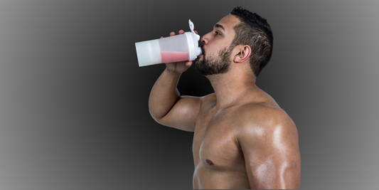 Man drinking beet root powder shake for exercise performance